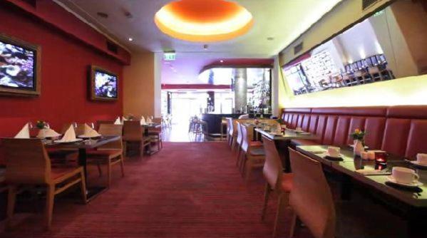 莫纳帕尔城市酒店 汉堡 餐厅 照片